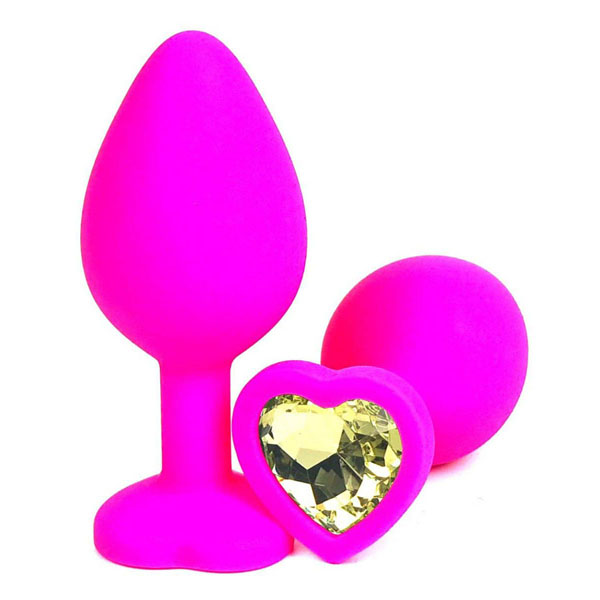 Розовая силиконовая пробка с желтым кристаллом-сердцем - 8,5 см.