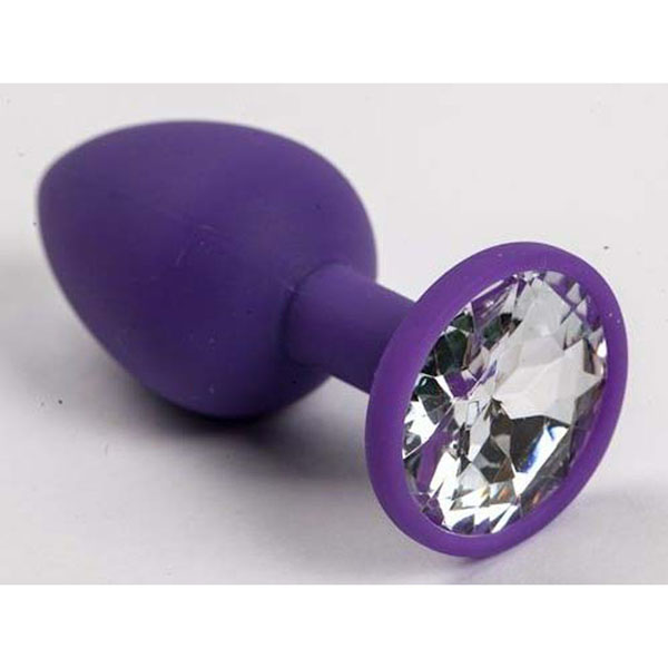 Фиолетовая силиконовая анальная пробка с прозрачным стразом - 7,1 см.