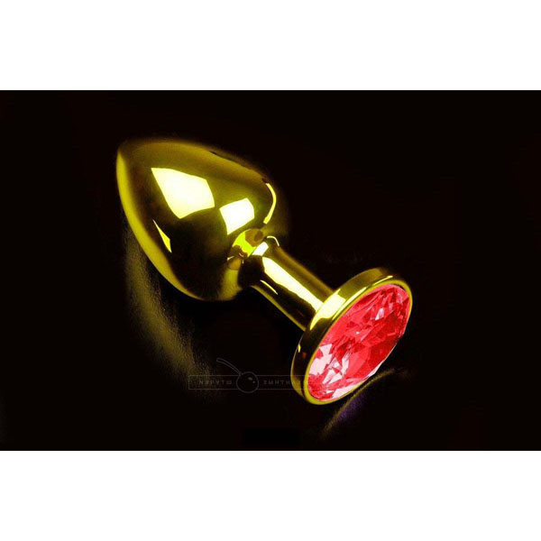 Маленькая золотистая анальная пробка с круглым кончиком и красным кристаллом - 7 см.