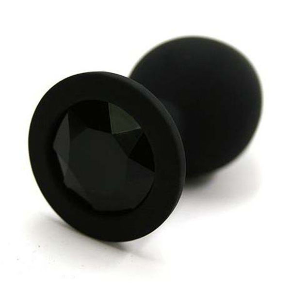 Чёрная силиконовая анальная пробка с чёрным кристаллом - 7 см.